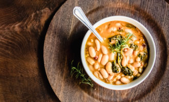 Italian White Bean Soup food photography on wooden table