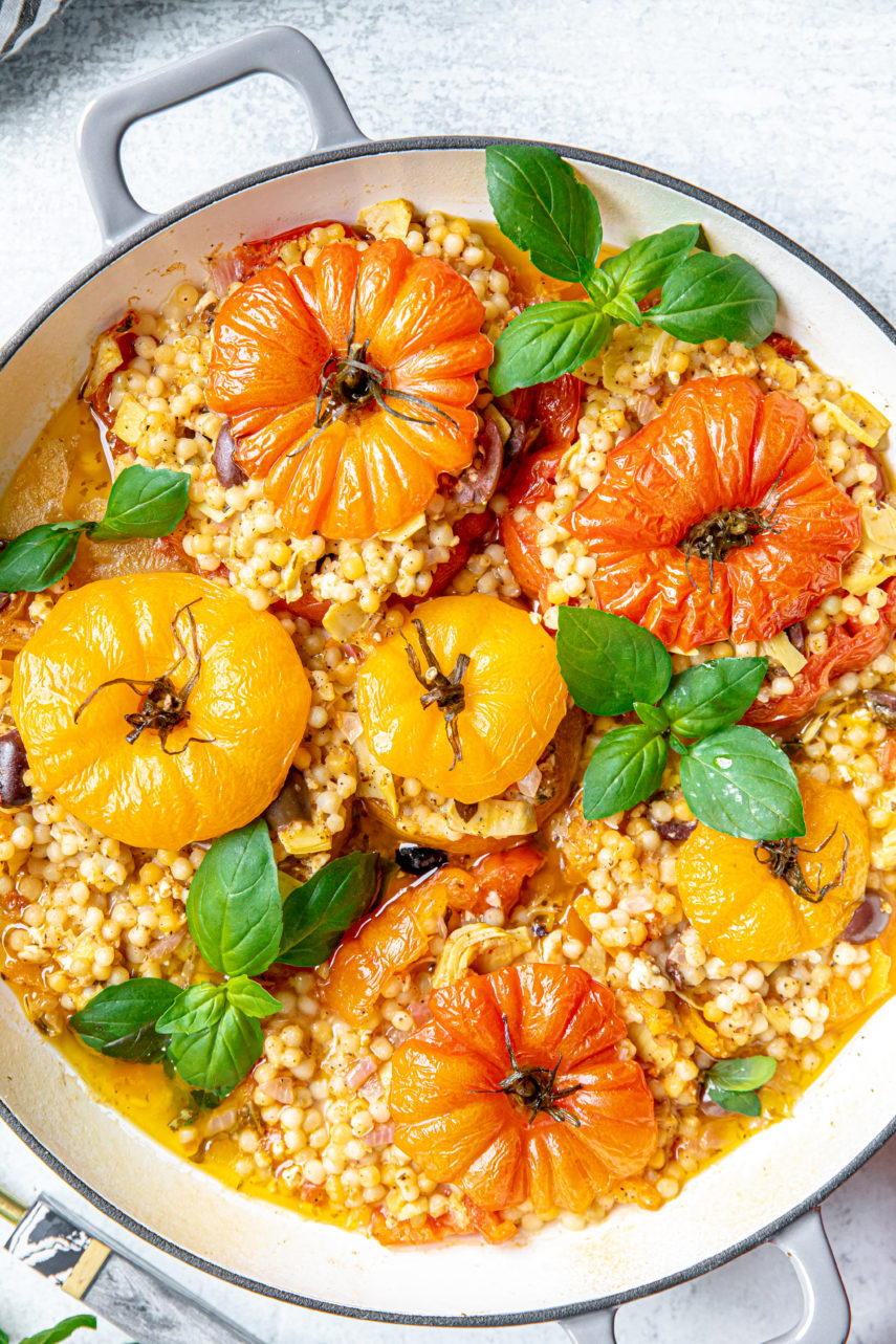 Mediterranean Couscous Stuffed Tomatoes with Feta & Artichokes